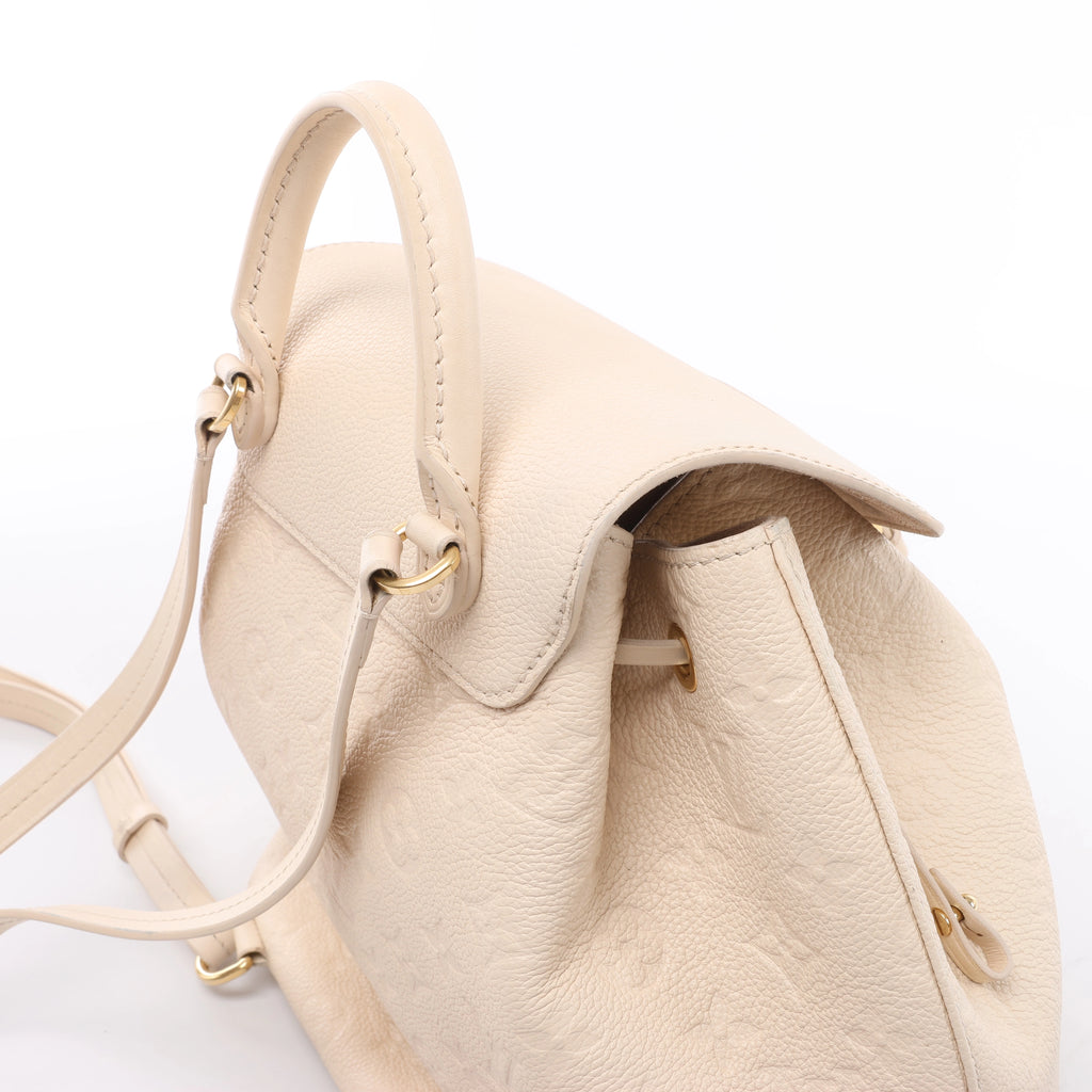 Mochila vintage de lona Louis Vuitton Montsouris MM Monogram en marrón M51136