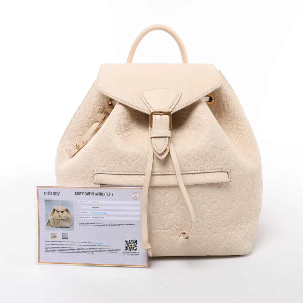 Mochila vintage de lona Louis Vuitton Montsouris MM Monogram en marrón M51136