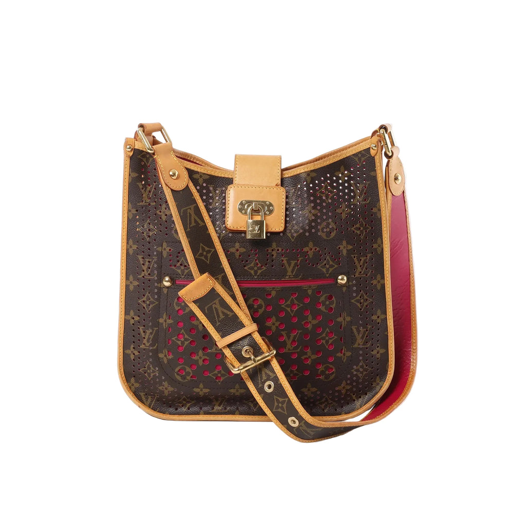 Louis Vuitton Musette shoulder bag in brown perforated monogram with pink underlay, natural leather trim, gold-tone padlock closure, front zip pocket, and adjustable monogram strap.