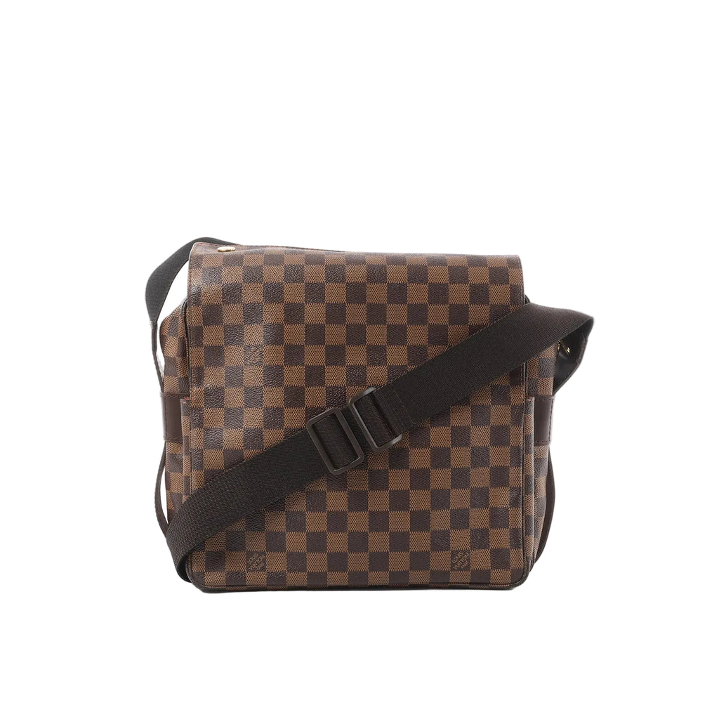 Louis Vuitton Naviglio shoulder bag in brown Damier Ebene check canvas with a wide adjustable black strap on a white background.