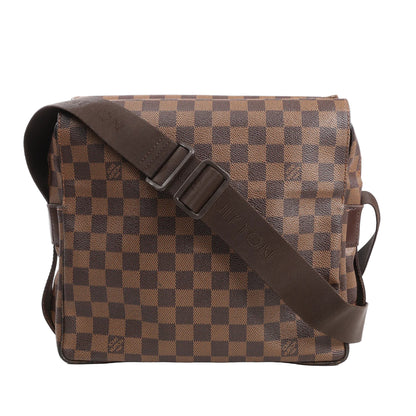 Louis Vuitton Naviglio shoulder bag in brown Damier Ebene canvas featuring a checkerboard pattern, flap closure, and adjustable fabric shoulder strap with embossed “Louis Vuitton” branding.
