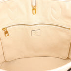 Louis Vuitton Neverfull MM Monogram Empreinte Shoulder Bag in White M46676