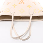 Louis Vuitton Neverfull MM Monogram Empreinte Gradient Shoulder Bag in Beige M46516