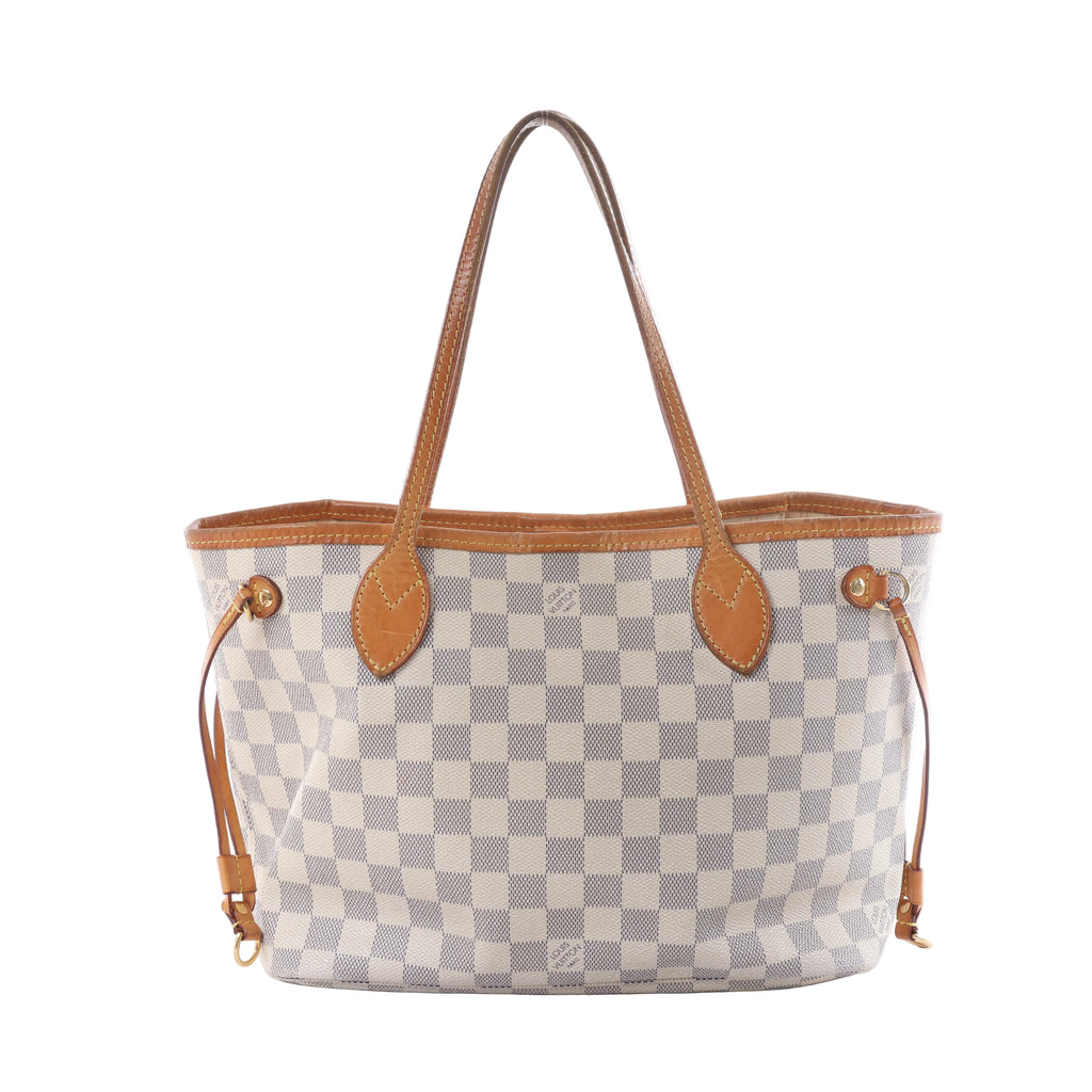 Louis Vuitton Neverfull PM tote in beige Damier Azur canvas with tan leather-look handles, trim and side drawstrings on a white background.