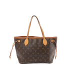 Louis Vuitton Monogram canvas Neverfull PM tote with tan leather trim, slim shoulder straps, and side drawstring laces on a white background.