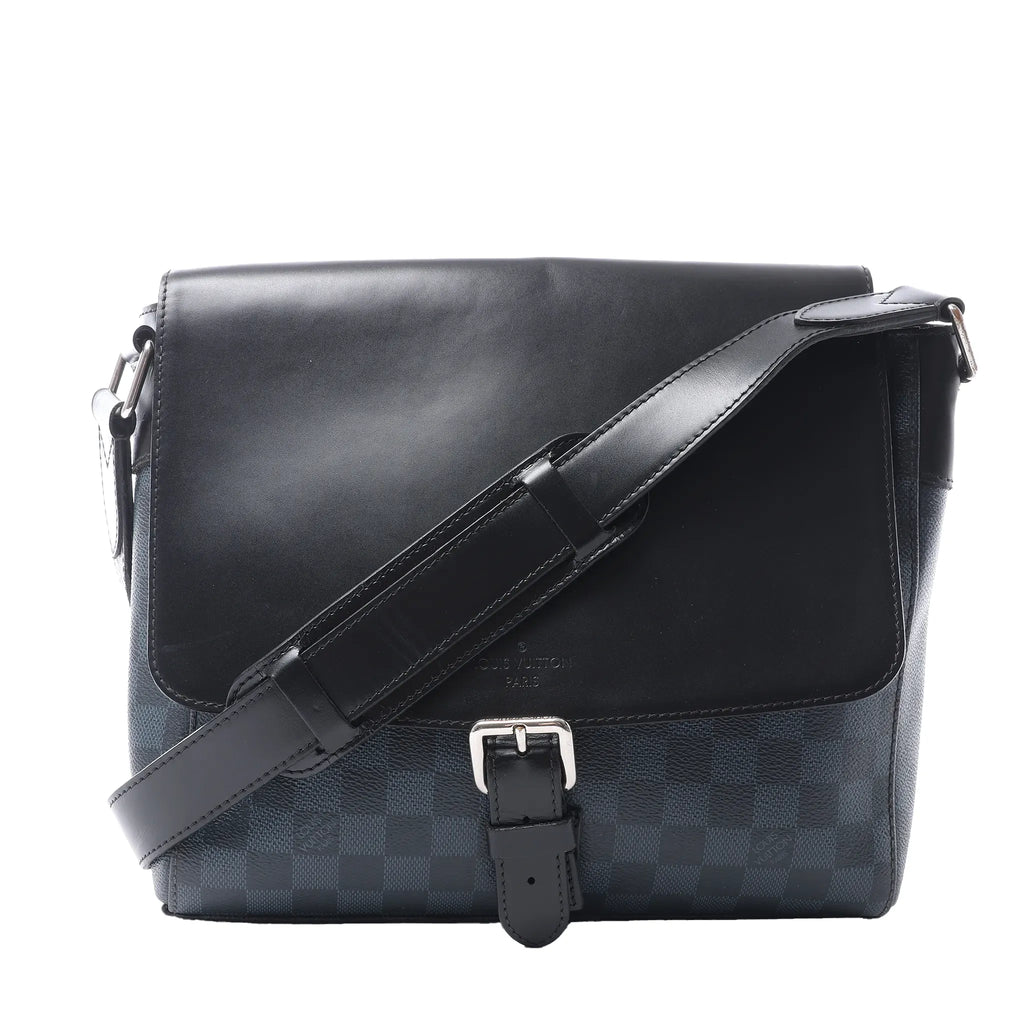 Louis Vuitton Newport PM messenger bag in navy Damier Cobalt canvas with black leather flap, silver-tone buckle and adjustable shoulder strap.