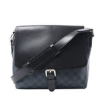Louis Vuitton Newport PM messenger bag in navy Damier Cobalt canvas with black leather flap, silver-tone buckle and adjustable shoulder strap.