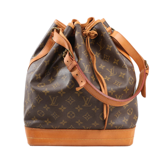 Louis Vuitton Monogram Canvas Noé shoulder bucket bag in brown with leather base, drawstring closure, and adjustable shoulder strap.