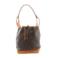 Louis Vuitton Noé brown Monogram canvas bucket shoulder bag with vachetta leather base and trim, drawstring closure with leather ties, and an adjustable vachetta shoulder strap, shown on a white background.