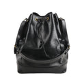 Louis Vuitton Noé M59002 shoulder bag in textured black Epi leather with a drawstring closure, gold-tone eyelets, and an adjustable leather strap.
