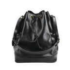 Louis Vuitton Noé M59002 shoulder bag in textured black Epi leather with a drawstring closure, gold-tone eyelets, and an adjustable leather strap.
