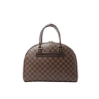 Louis Vuitton Nolita handbag in brown Damier Ebene checkerboard canvas with dome silhouette, double top handles, and zip-top closure.