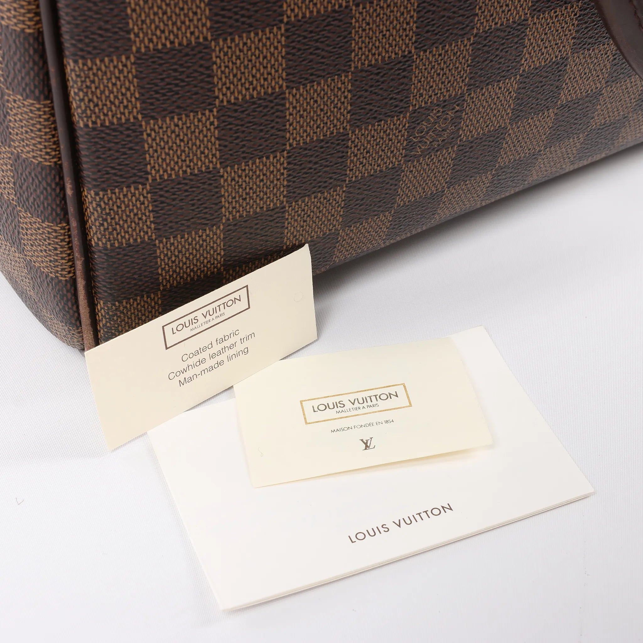 Louis Vuitton Nolita Damier Ebene Handbag in Brown N41455