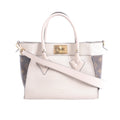 Beige Louis Vuitton On My Side PM leather handbag with brown Monogram canvas side panels, top handles, shoulder strap and gold-tone turn-lock.