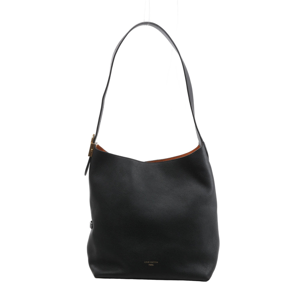 Black Louis Vuitton Low Key Hobo MM leather shoulder bag with a long strap, softly structured silhouette and subtle gold-tone detailing.