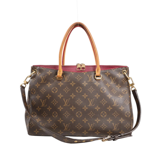 Louis Vuitton Pallas MM 2Way handbag featuring Monogram canvas with red leather trim, dual top handles, detachable shoulder strap, and gold-tone hardware.
