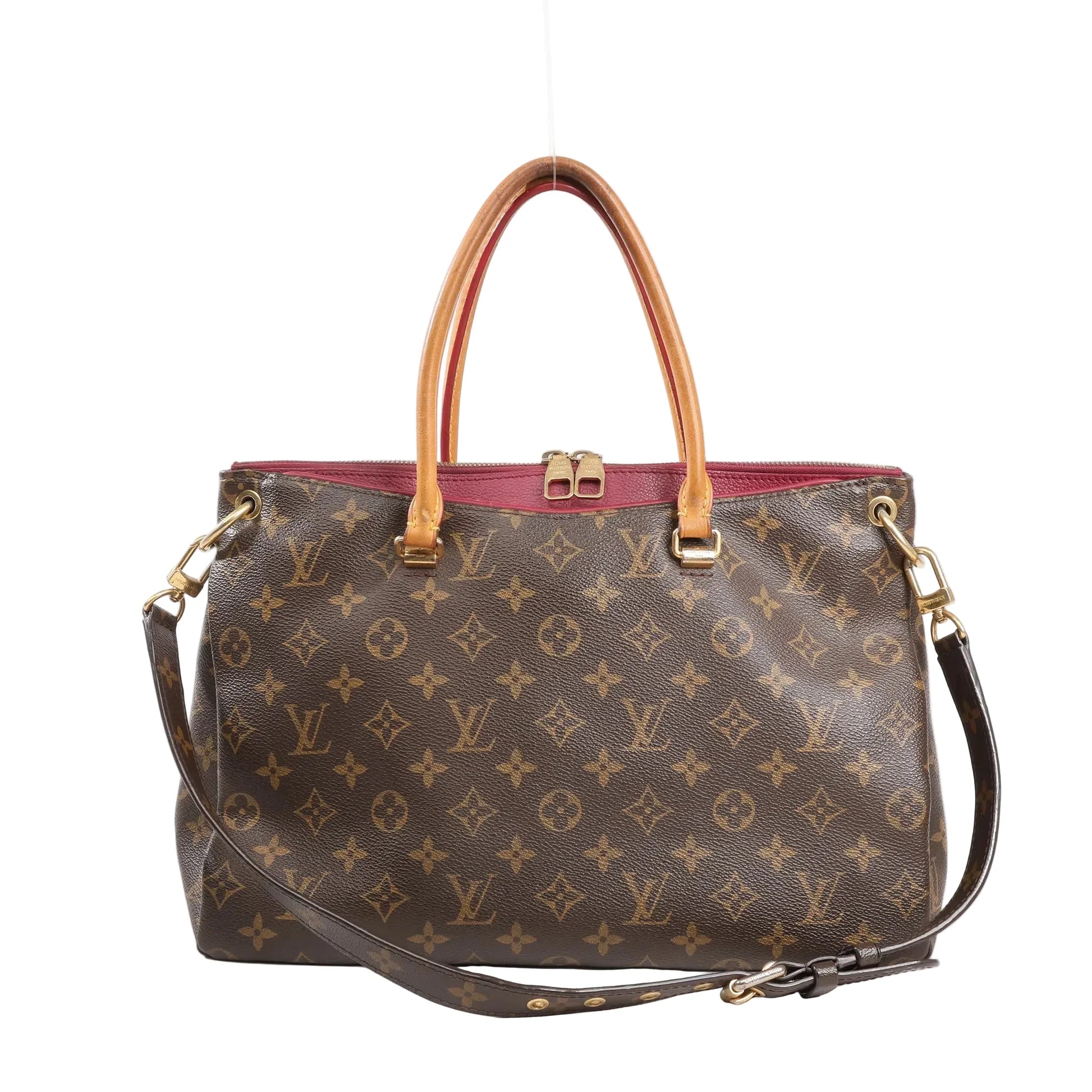 Louis Vuitton Pallas MM 2Way handbag featuring Monogram canvas with red leather trim, dual top handles, detachable shoulder strap, and gold-tone hardware.