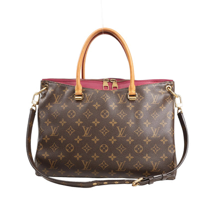 Louis Vuitton Pallas MM handbag in brown Monogram canvas with red calf leather trim, natural leather handles, gold-tone hardware, and detachable shoulder strap.