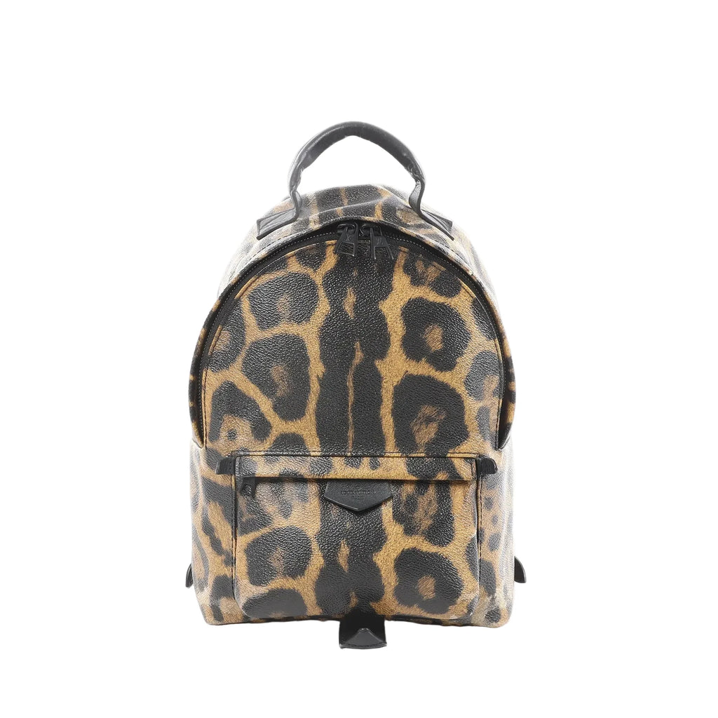 Louis Vuitton Palm Springs PM mini backpack in brown and black animal print with black top handle, double zip closure, and front zip pocket.