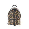 Louis Vuitton Palm Springs PM mini backpack in brown and black animal print with black top handle, double zip closure, and front zip pocket.