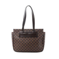 Louis Vuitton Parioli PM shoulder bag in brown Damier Ebene coated canvas with dark brown leather shoulder straps, front leather logo panel and open tote silhouette on a white background.