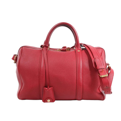 Louis Vuitton Parnassea Sofia Coppola PM 2Way handbag in red calf leather with dual top handles, detachable shoulder strap, gold-tone hardware, and structured silhouette.
