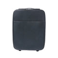 Front view of a black Louis Vuitton Pegase 45 Taiga leather rolling travel bag with zip closure, front pocket and visible wheels on a white background.