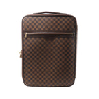 Brown Louis Vuitton Pegase 55 travel bag in Damier Ebene checkered canvas with dark leather trim, top handle, front zip pocket and gold-tone zippers.
