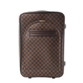 Louis Vuitton Pegase 60 upright travel bag in brown Damier Ebene checkered canvas with leather trim, gold-tone zips and a curved front pocket.