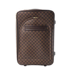Louis Vuitton Pegase 60 upright travel bag in brown Damier Ebene checkered canvas with leather trim, gold-tone zips and a curved front pocket.