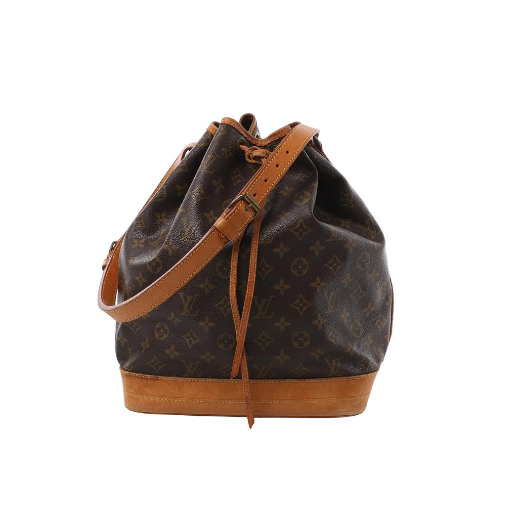 Louis Vuitton Noé Monogram canvas bucket shoulder bag with tan leather trim, drawstring closure, adjustable leather strap, and leather base on white background