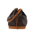 Louis Vuitton Noé Monogram canvas bucket shoulder bag with tan leather trim, drawstring closure, adjustable leather strap, and leather base on white background