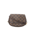 Louis Vuitton Ipanema Pochette crossbody bag in brown Damier Ebene checkered canvas with front flap, slim brown strap, and gold-tone hardware.