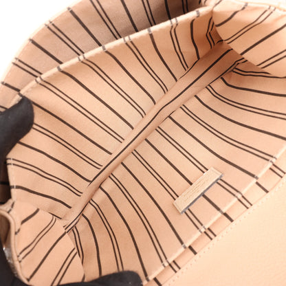 Louis Vuitton Pochette Metis MM Monogram Empreinte Sac à bandoulière en Rose M44300