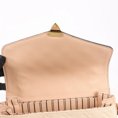 Louis Vuitton Pochette Metis MM Monogram Empreinte Sac à bandoulière en Rose M44300