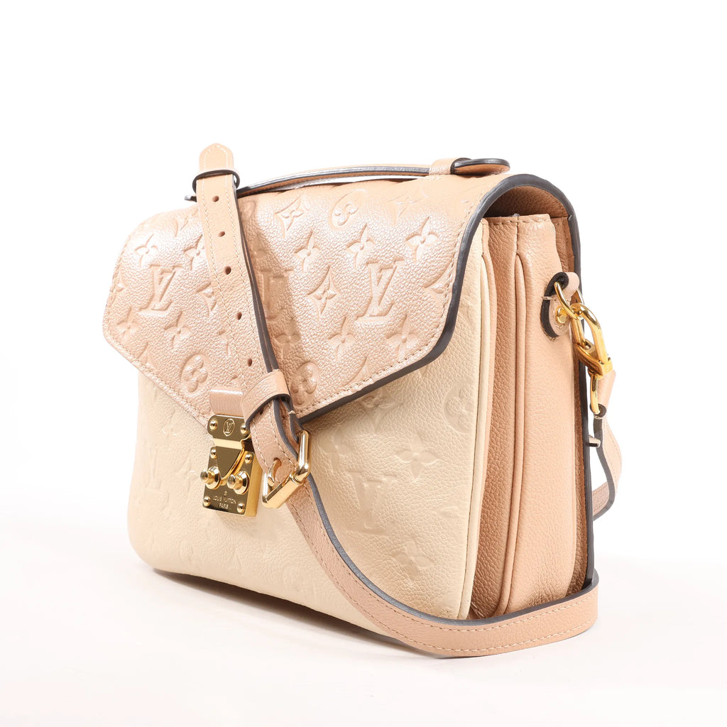Louis Vuitton Pochette Metis MM Monogram Empreinte Crossbody Bag in Pink M44300