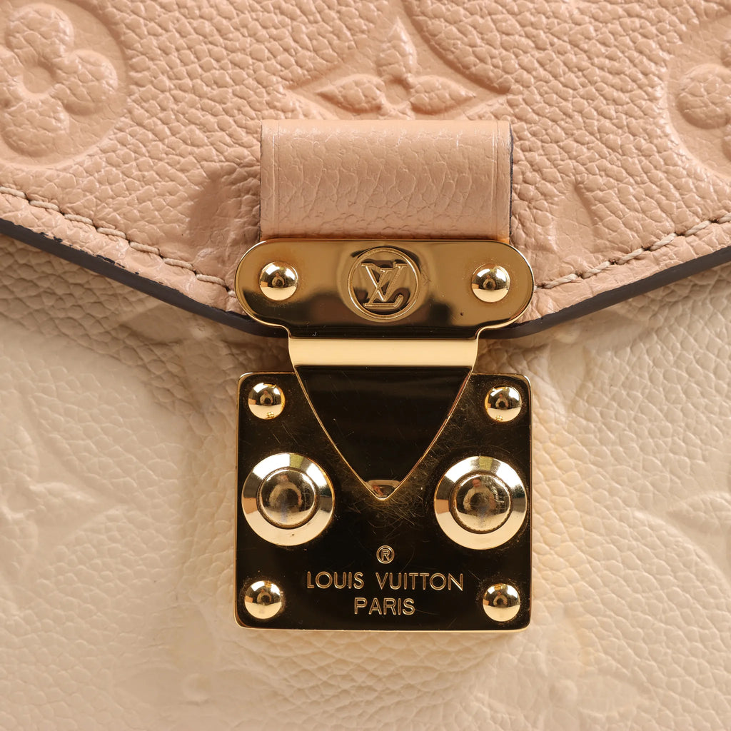 Louis Vuitton Pochette Metis MM Monogram Empreinte Crossbody Bag in Pink M44300