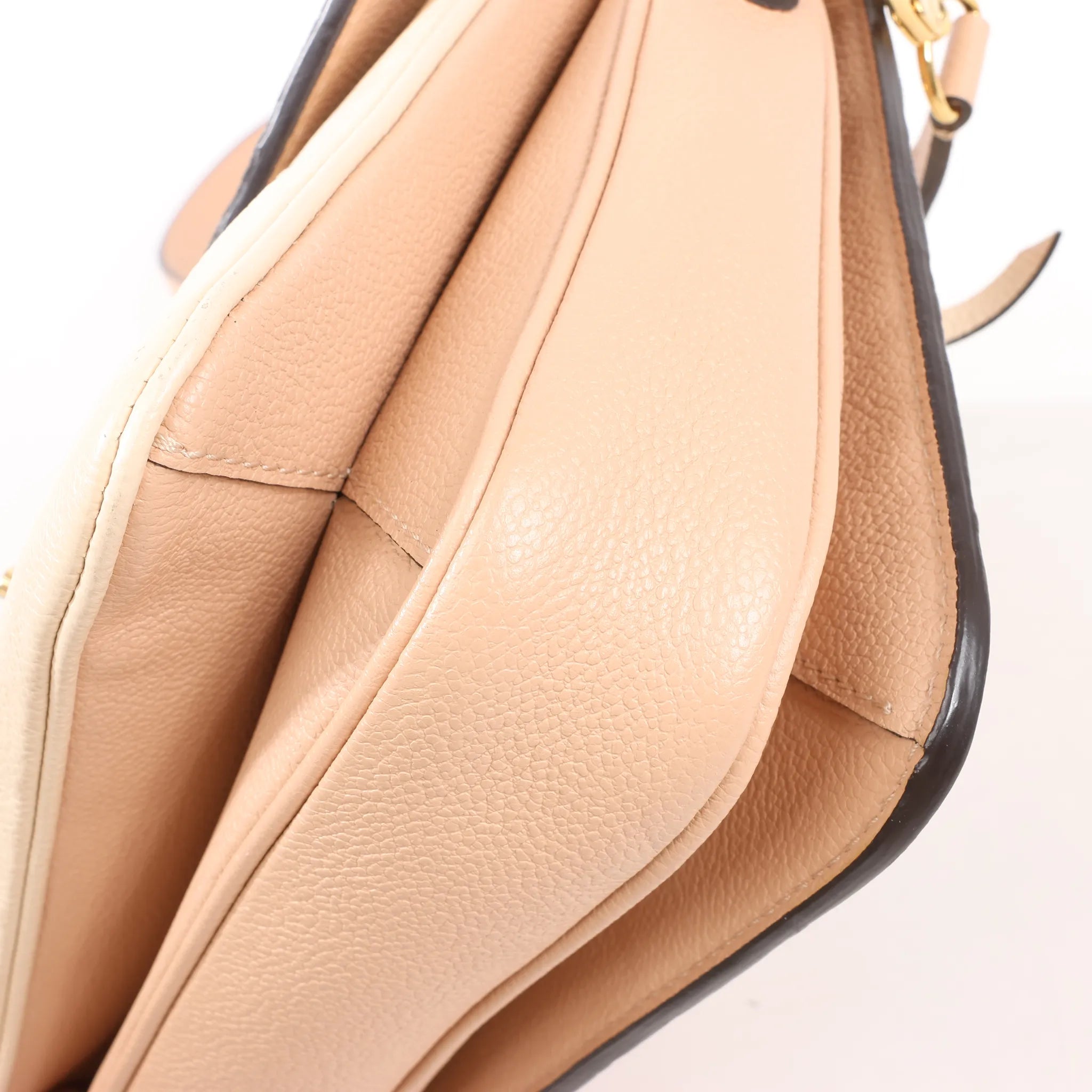 Louis Vuitton Pochette Metis MM Monogram Empreinte Crossbody Bag in Pink M44300