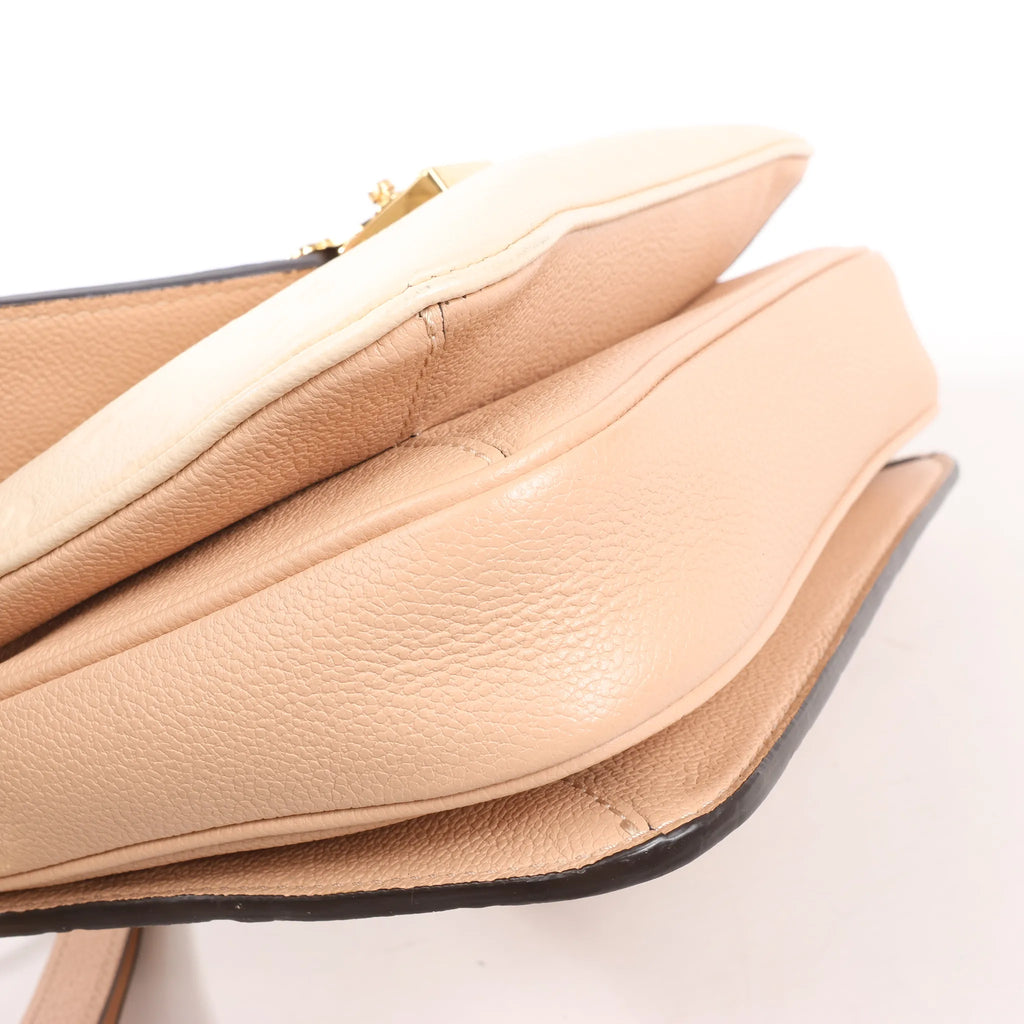 Louis Vuitton Pochette Metis MM Monogram Empreinte Crossbody Bag in Pink M44300