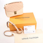 Louis Vuitton Pochette Metis MM Monogram Empreinte Crossbody Bag in Pink M44300
