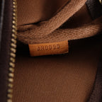 Bolso de mano Louis Vuitton Pochette Accessoir de lona con monograma en marrón M51980