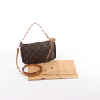 Bolso de mano Louis Vuitton Pochette Accessoir de lona con monograma en marrón M51980