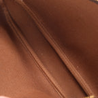 Bolso de mano Louis Vuitton Pochette Accessoir de lona con monograma en marrón M51980