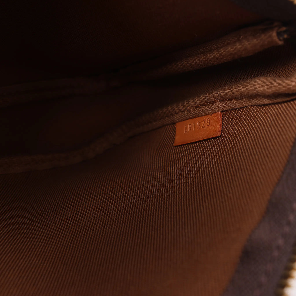 Louis Vuitton Pochette Accessoir Monogram Canvas Handbag in Brown M51980
