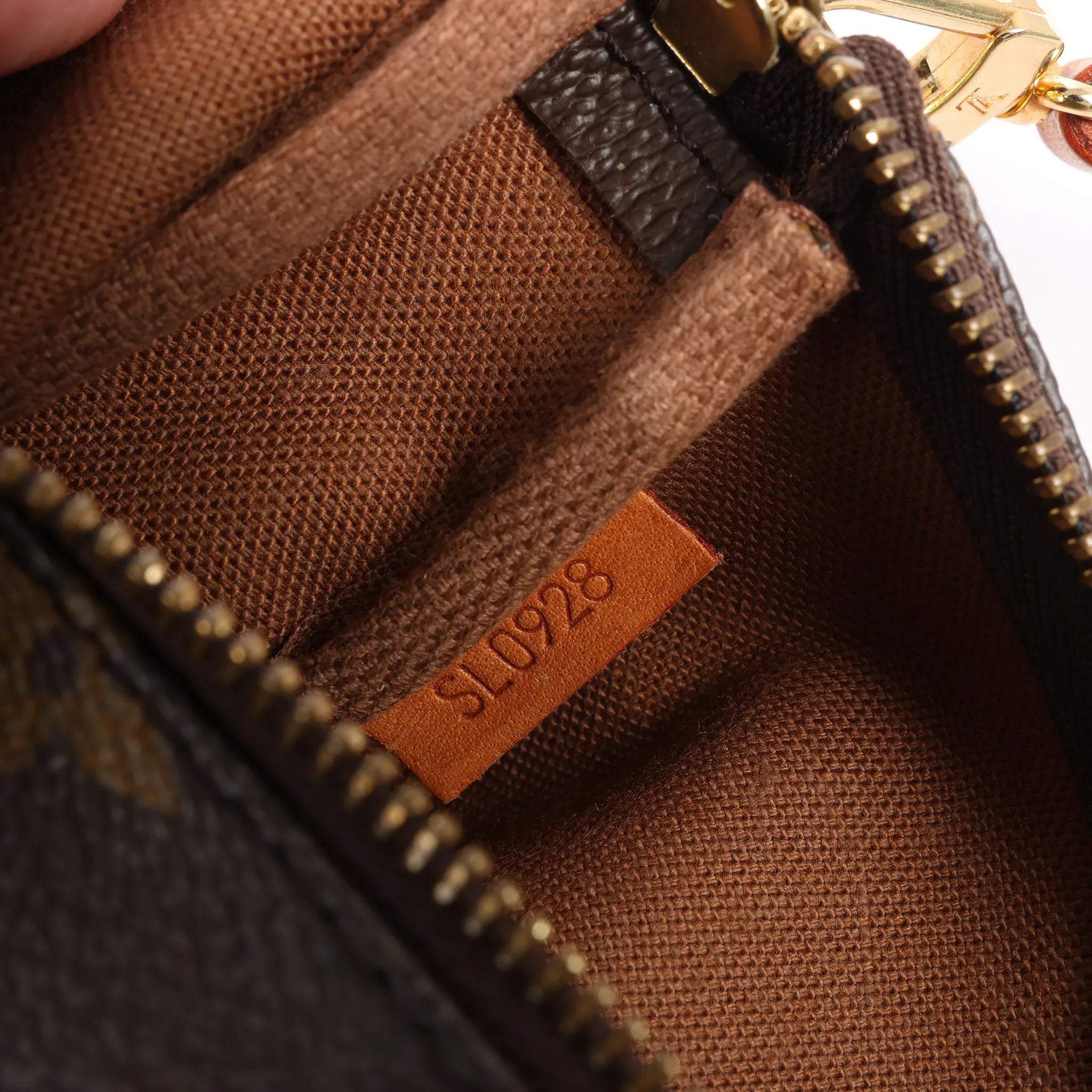 Louis Vuitton Pochette Accessoir Monogram Canvas Handbag in Brown M51980