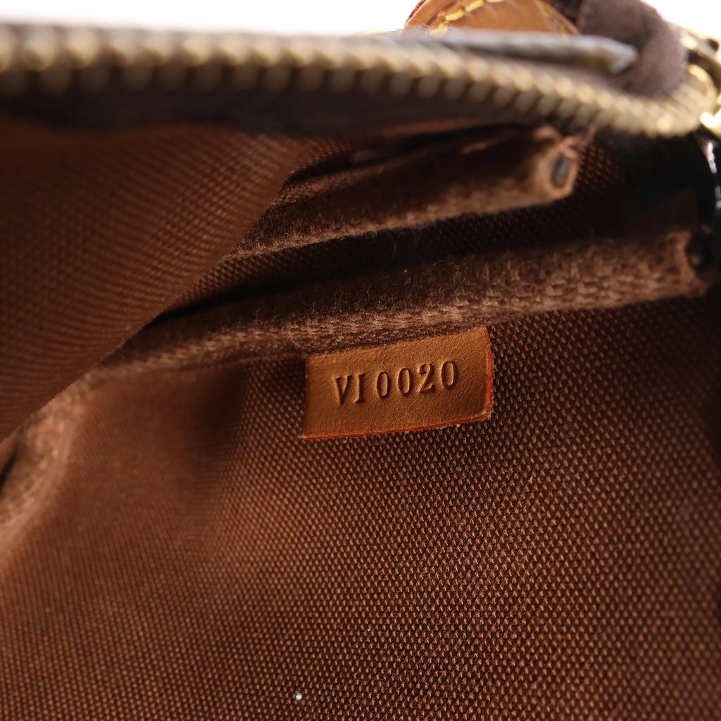 Louis Vuitton Pochette Accessoir Monogram Canvas Handbag in Brown M51980