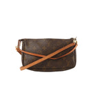 Louis Vuitton Pochette Accessoires Monogram canvas bag with vachetta leather crossbody strap across the front and gold-tone hardware on a white background.