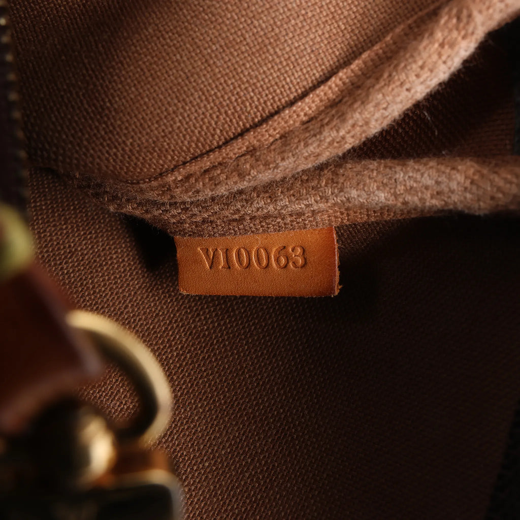 Louis Vuitton Pochette Accessoir Monogram Canvas Handbag in Brown M51980