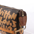 Louis Vuitton Pochette Accessoire Monogram Graffiti Handbag in Brown M92193