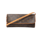 Brown Louis Vuitton Monogram canvas Pochette Twin GM crossbody bag with tan leather strap and tan leather trim, flap front